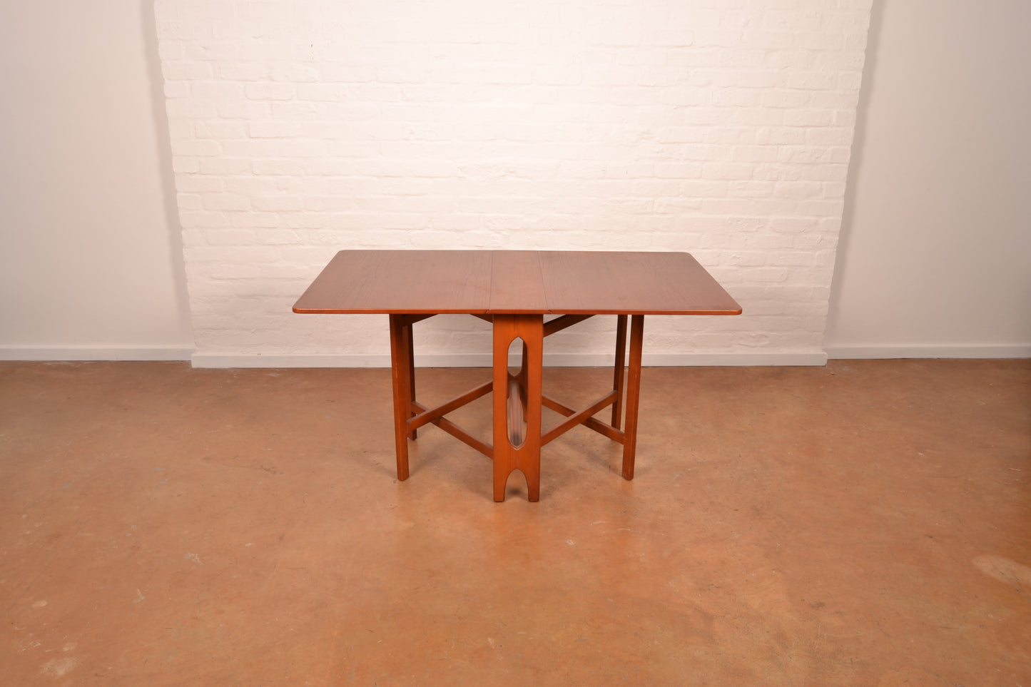 Scandinavian Mid-Century Modern Drop Leaf dining table in Burmese Teak