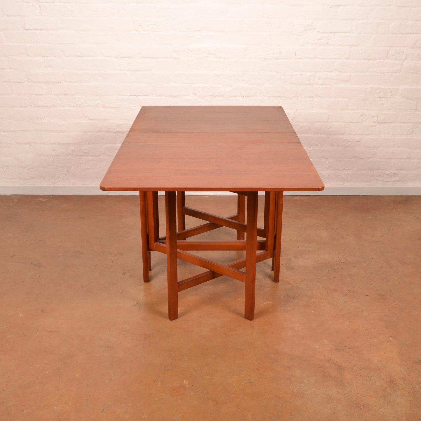 Scandinavian Mid-Century Modern Drop Leaf dining table in Burmese Teak
