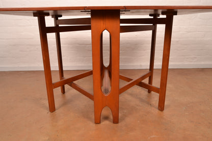 Scandinavian Mid-Century Modern Drop Leaf dining table in Burmese Teak