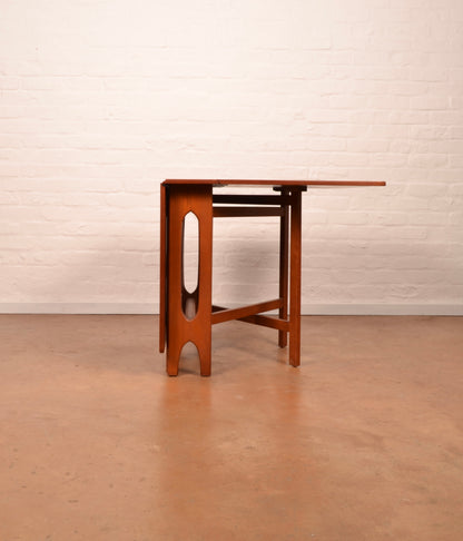 Scandinavian Mid-Century Modern Drop Leaf dining table in Burmese Teak